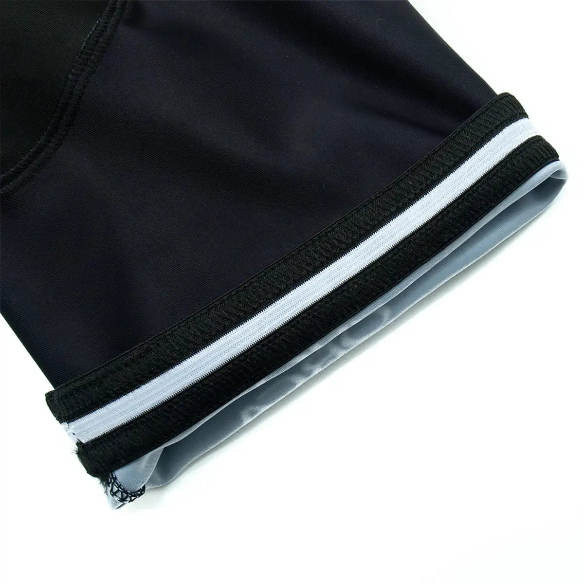 UAE Cycling Jersey Set, men's short-sleeve jersey in black with white cuff stripe and Velcro strap detail