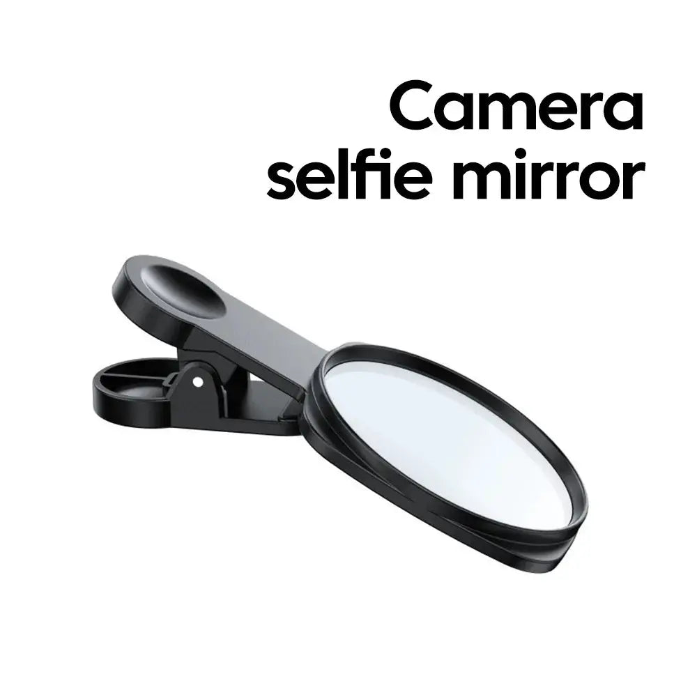 Camera selfie mirror clip for smartphones; black clip-on magnifier for phone cameras.