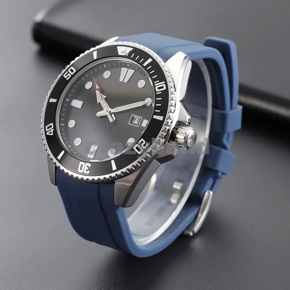 Blue silicone watch strap (20–22mm) with curved end, shown on a stainless steel dive watch