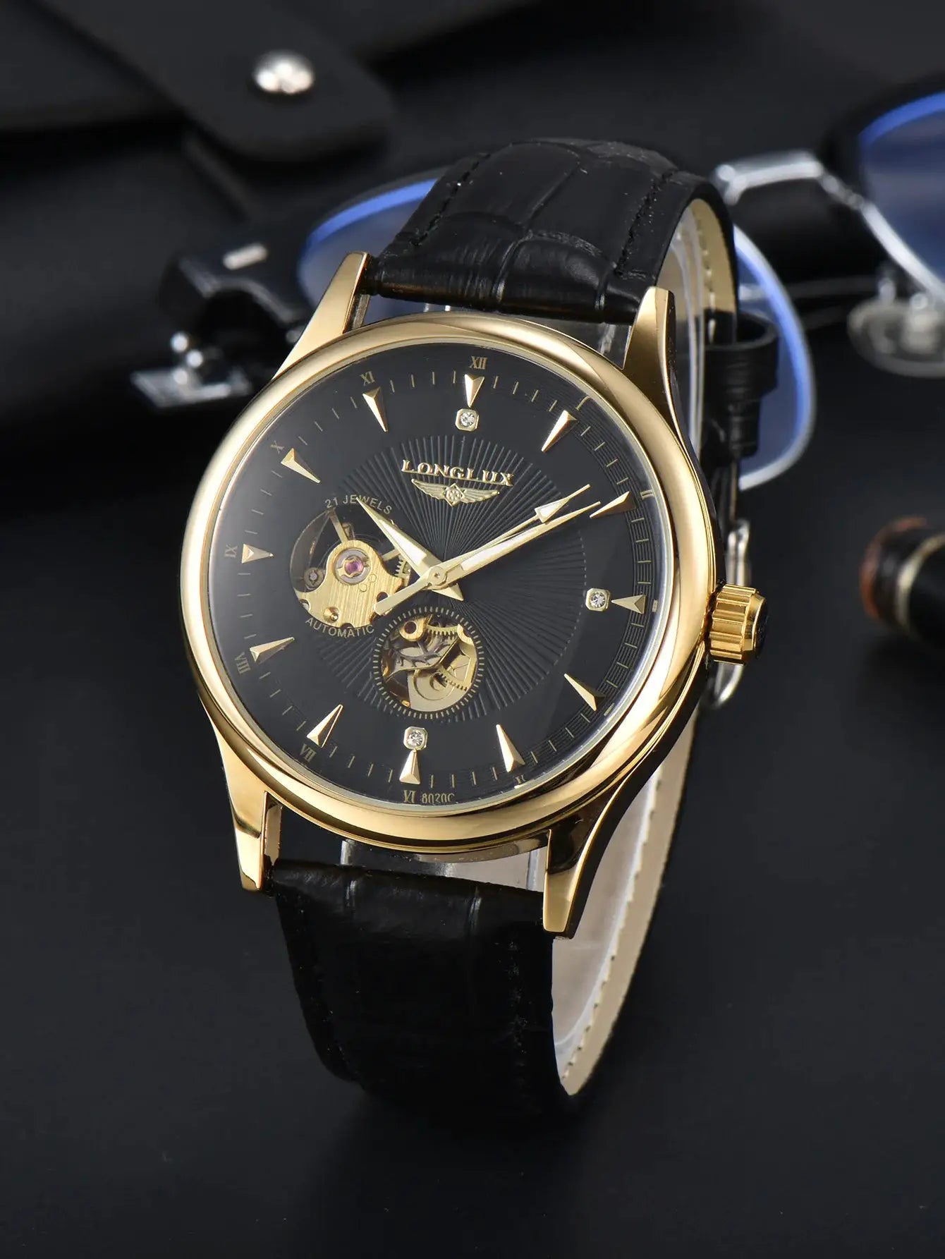 LONGLUX automatic skeleton men's wristwatch with gold-tone case, black dial, open-heart movement, black leather strap