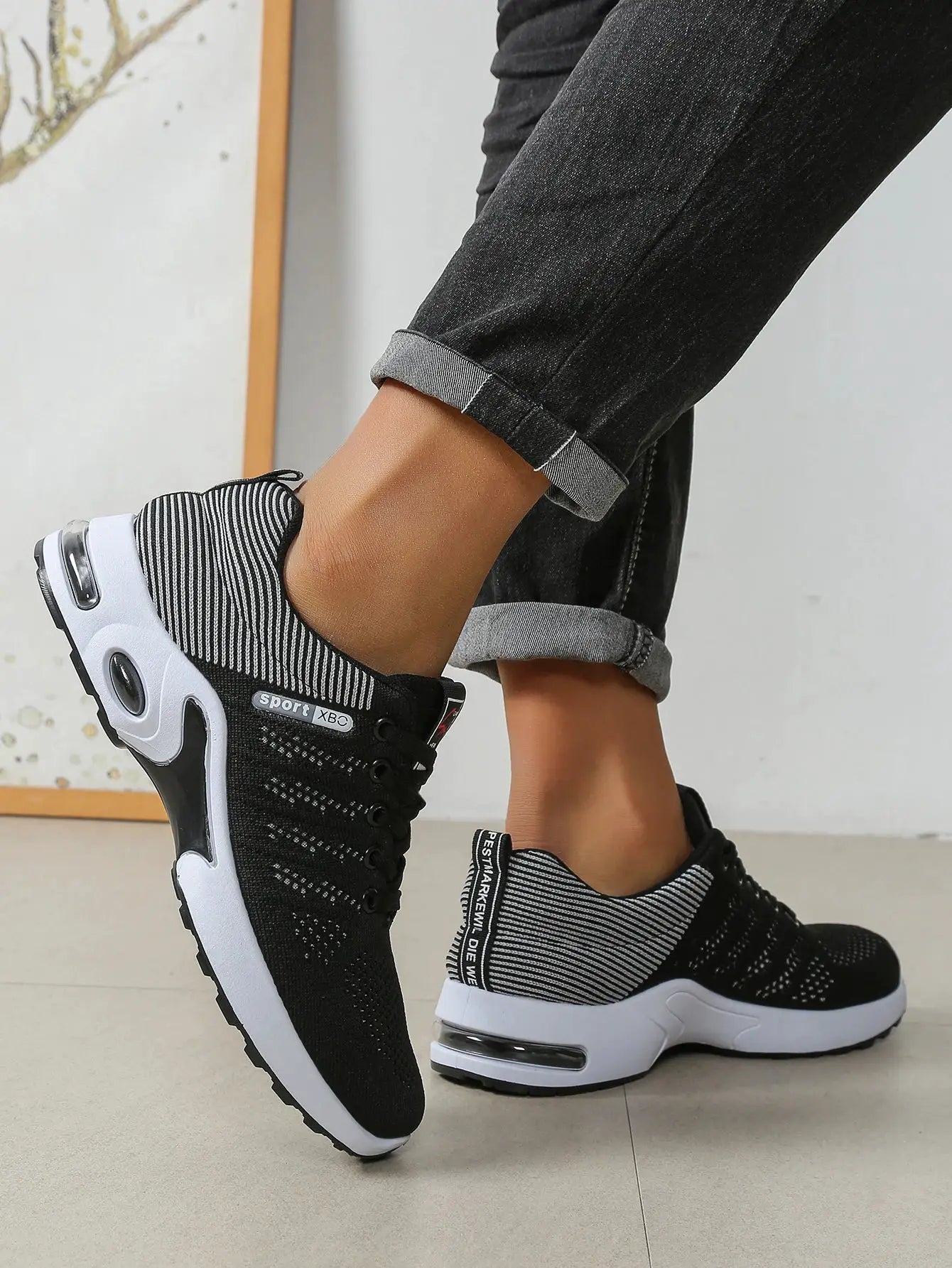 Men's lace-up running shoes by Simples Market, black knit upper with white sole