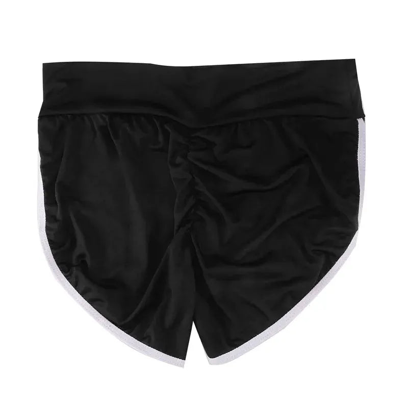 Women's black gym shorts by Simples Market with white trim, low-rise stretchy design