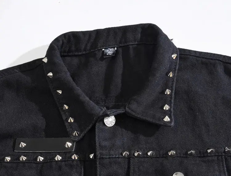 Simples Market black denim sleeveless vest with silver pyramid studs along collar and front panels