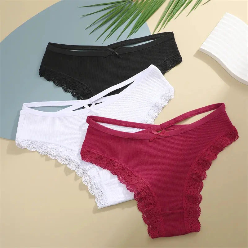3-pack women's cotton lace-trim bikini briefs in black, white, and burgundy