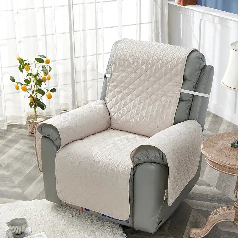 Recliner chair cover by Simples Market; beige quilted anti-slip slipcover for a gray living room armchair.