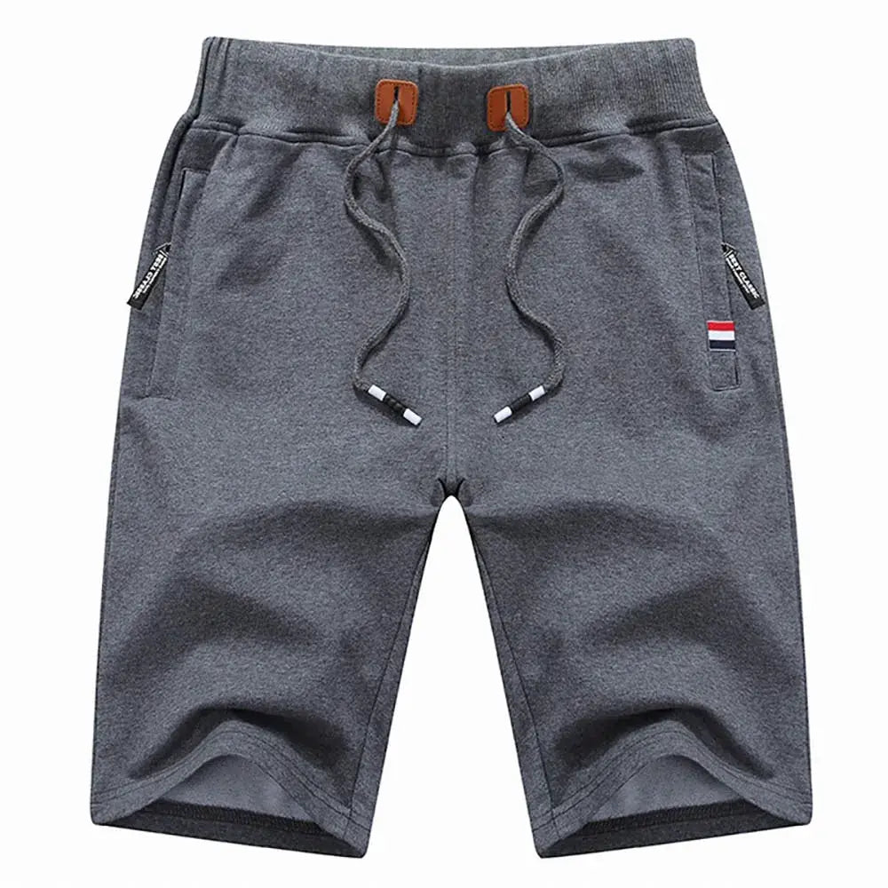 Men's gray cotton shorts with drawstring waist, knee-length, and side pockets.
