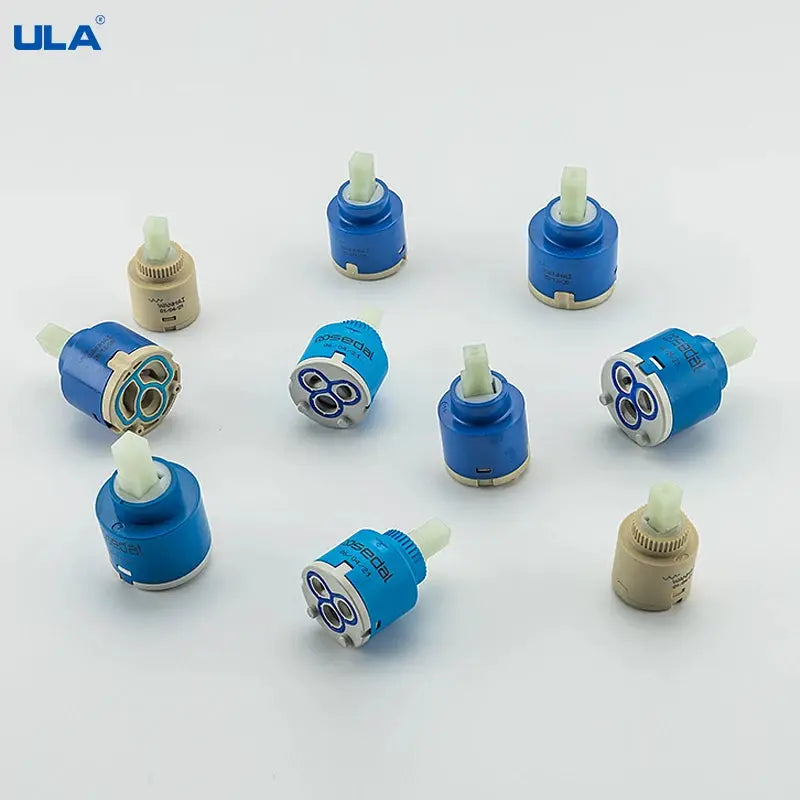 Faucet valve cores set, blue and beige ceramic cartridges, 10 pcs, ULA logo visible