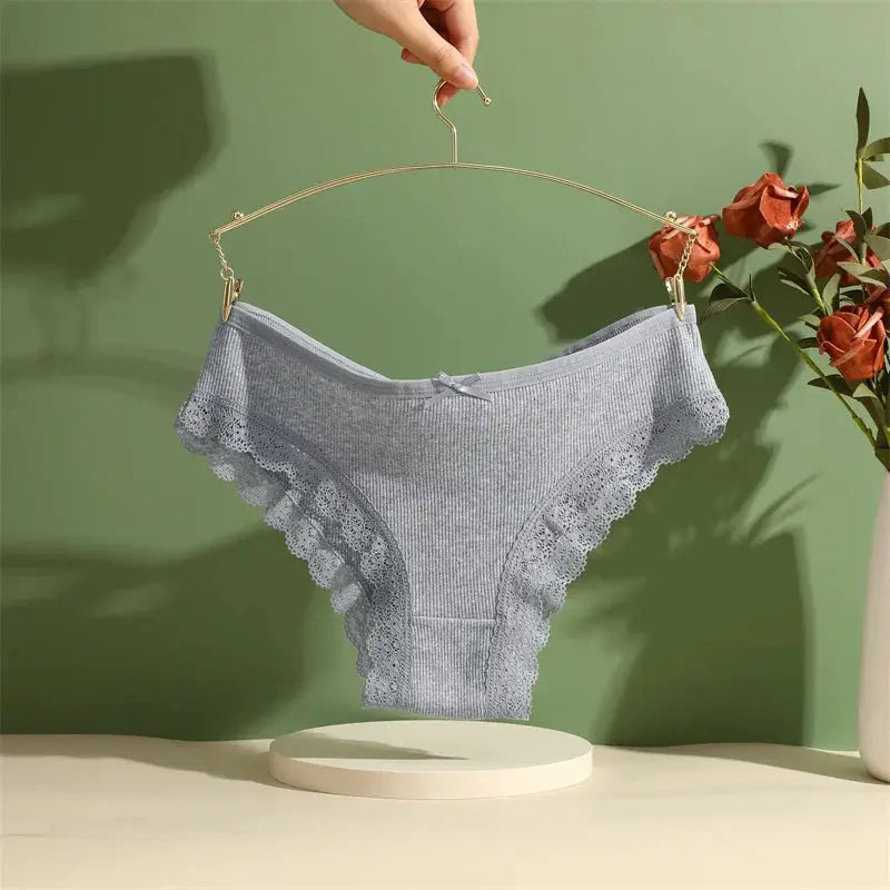 Women's cotton lace-trim briefs in gray by Simples Market on hanger