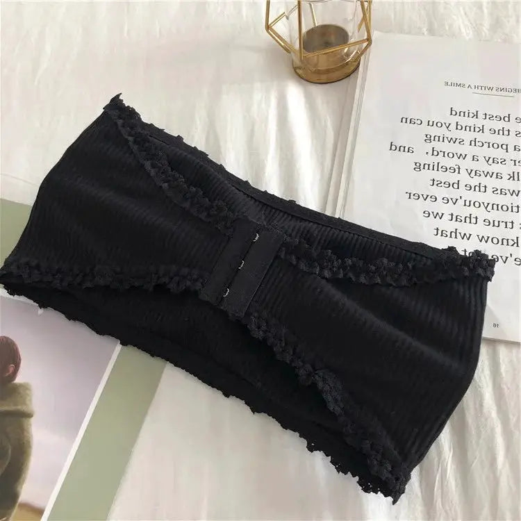 Lace strapless bra, black, with ribbed fabric and front closure.