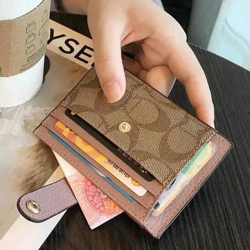 Monogram ultra-thin card holder wallet in brown with pink edge trim and card slots