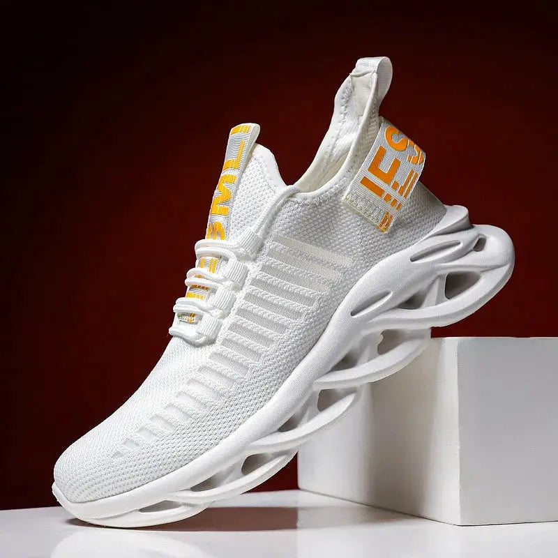 White unisex running sneakers with breathable knit upper and chunky sculpted sole