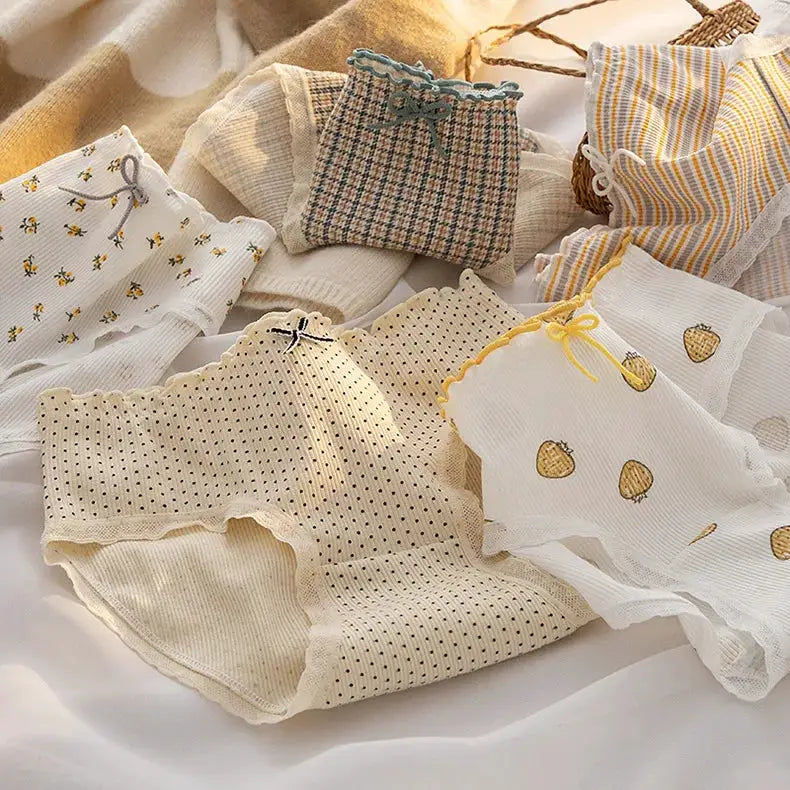 Womens cotton underwear set in assorted pastel prints; mid-waist briefs with lace trim and bows