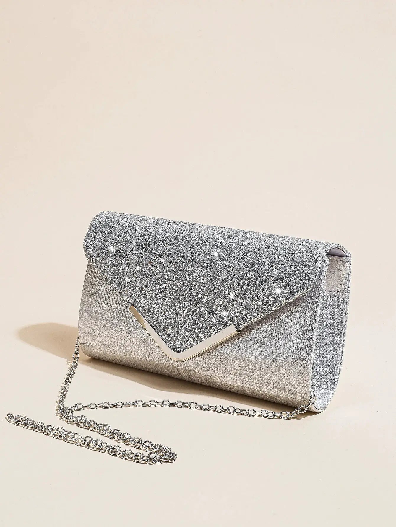 Simples Market silver sequin envelope clutch with chain crossbody strap