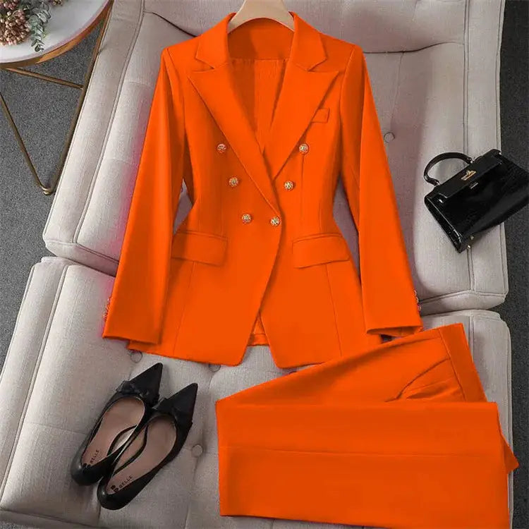 Orange women's blazer and pants two-piece office suit by Simples Market, double-breasted with gold buttons.