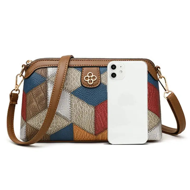 Simples Market small cross-body bag with brown leather trim in multicolor patchwork geometric pattern