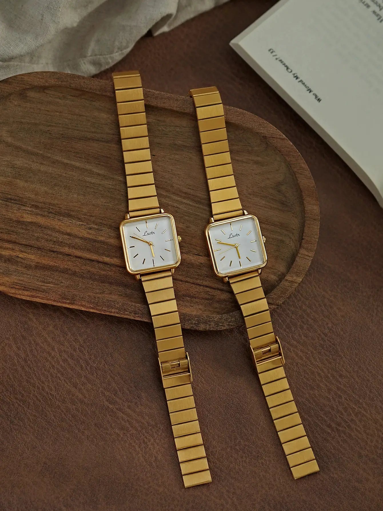 Two gold-tone square-dial women's watches with stainless steel straps by Simples Market