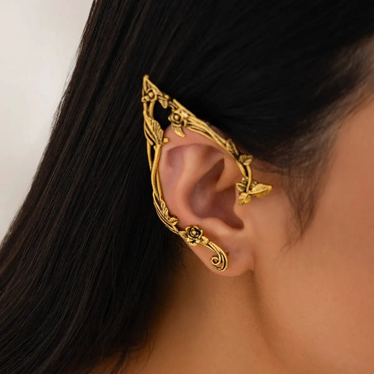Gold-tone elf flower leaf ear clip; ornate ear cuff jewelry accessory