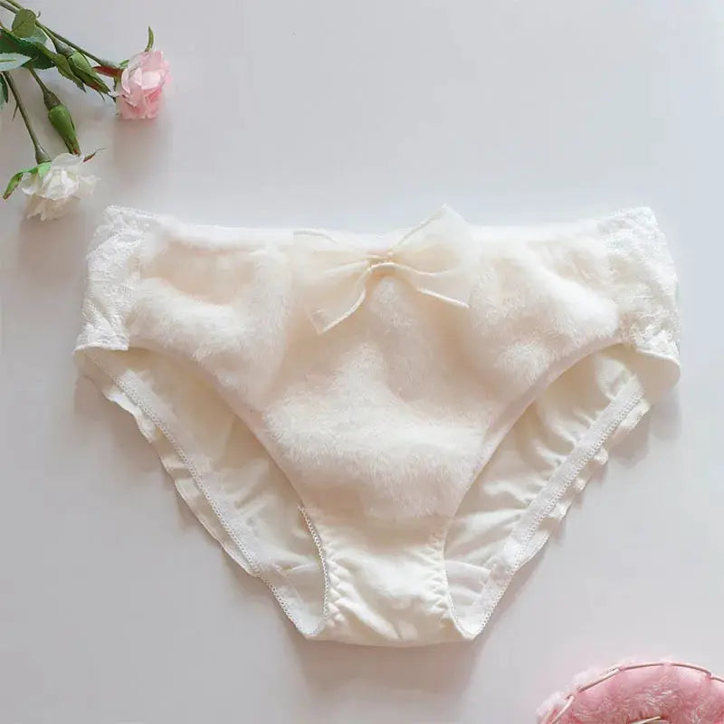 Womens cotton panties with lace trim and bow, soft cream color