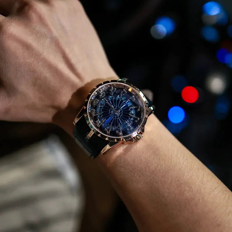 Men's quartz watch with blue dial, rose-gold case, and black strap.