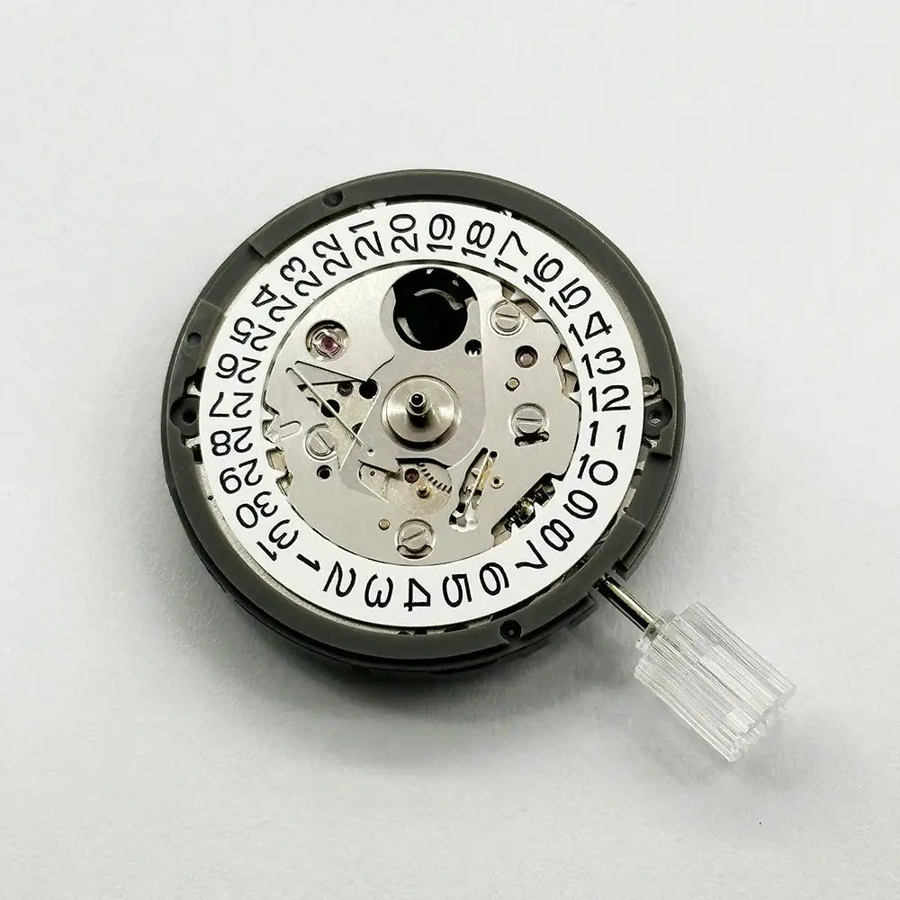 NH35A automatic watch movement, silver-toned with date wheel at 3 o'clock and exposed gears