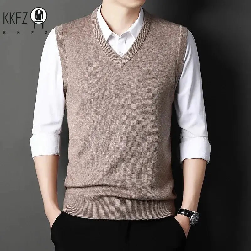 Men's brown V-neck knitted vest worn over a white shirt; casual warm top, KKFZ logo visible