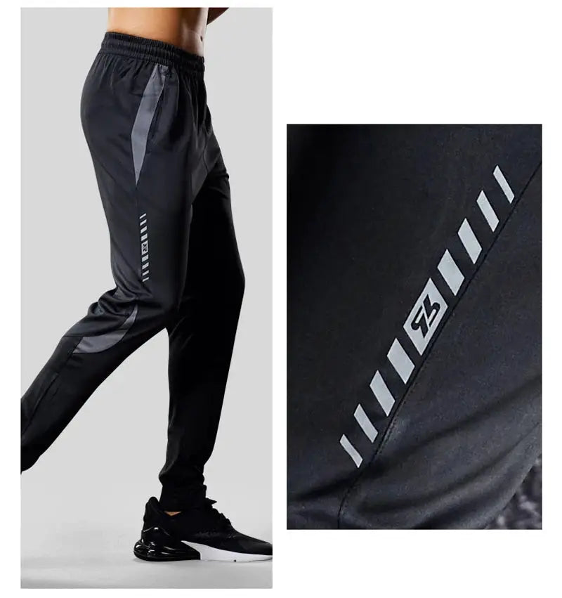 Men's sport pants by Simples Market in black with gray side panels and zipper pockets