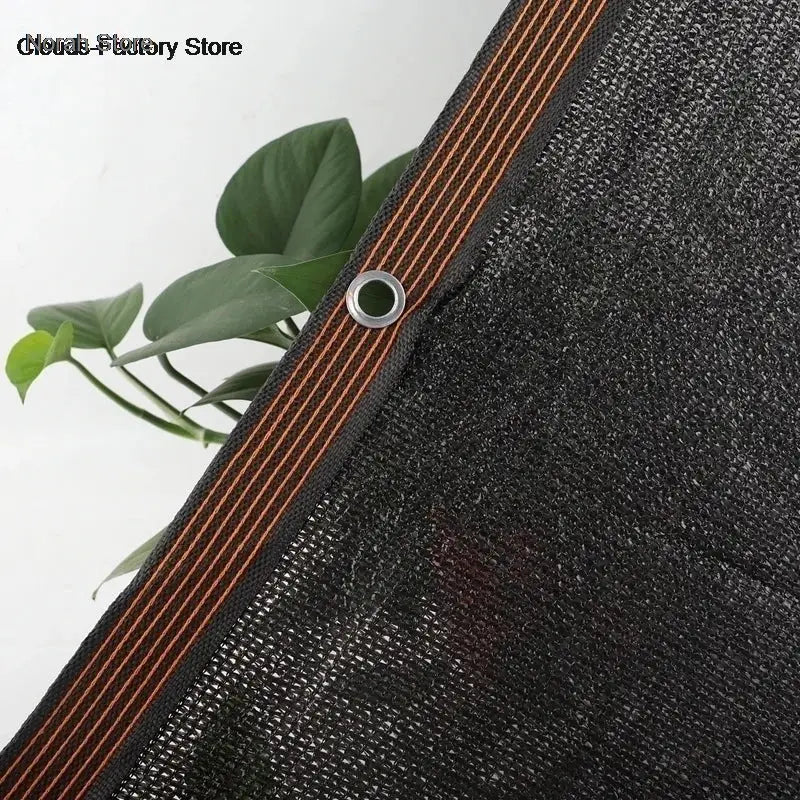 Simples Market 6x6m black shade cloth with grommets and orange-stitched edge for garden or greenhouse.