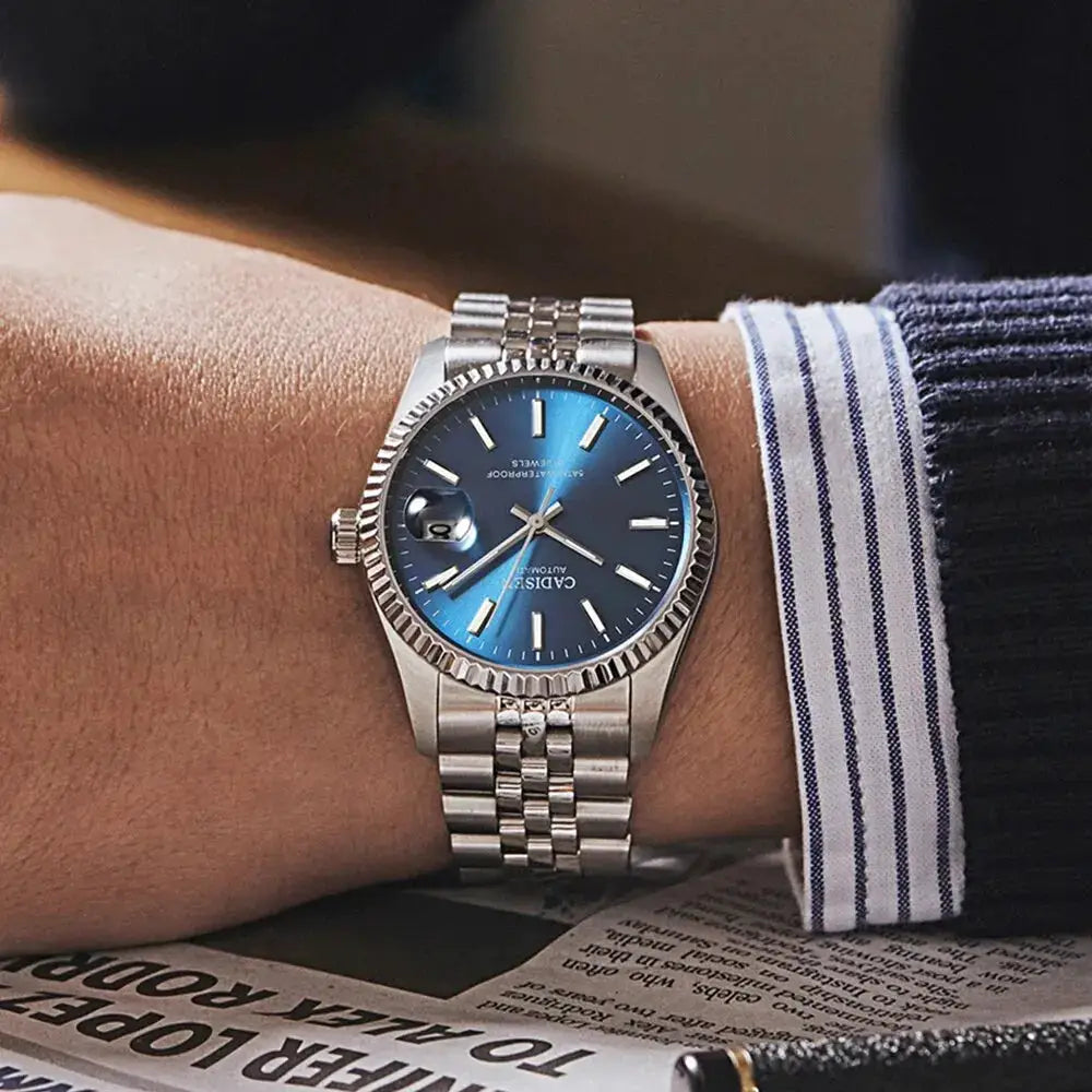 CADISEN men's stainless steel automatic watch with blue dial and date window