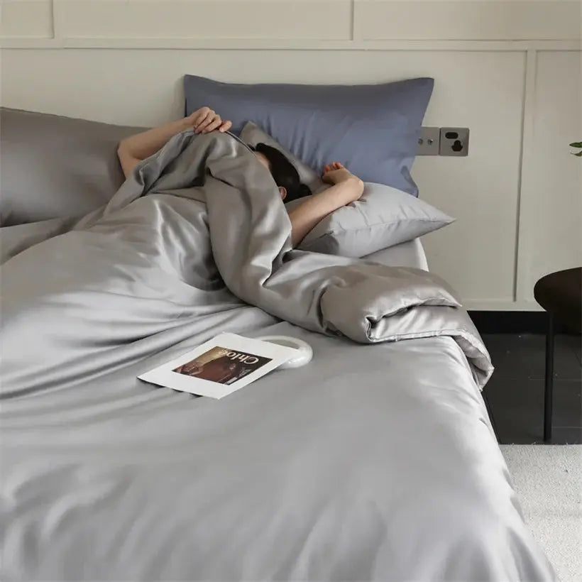 Mulberry Silk Bedding Set on gray bed; 100% silk duvet cover with pillowcases.