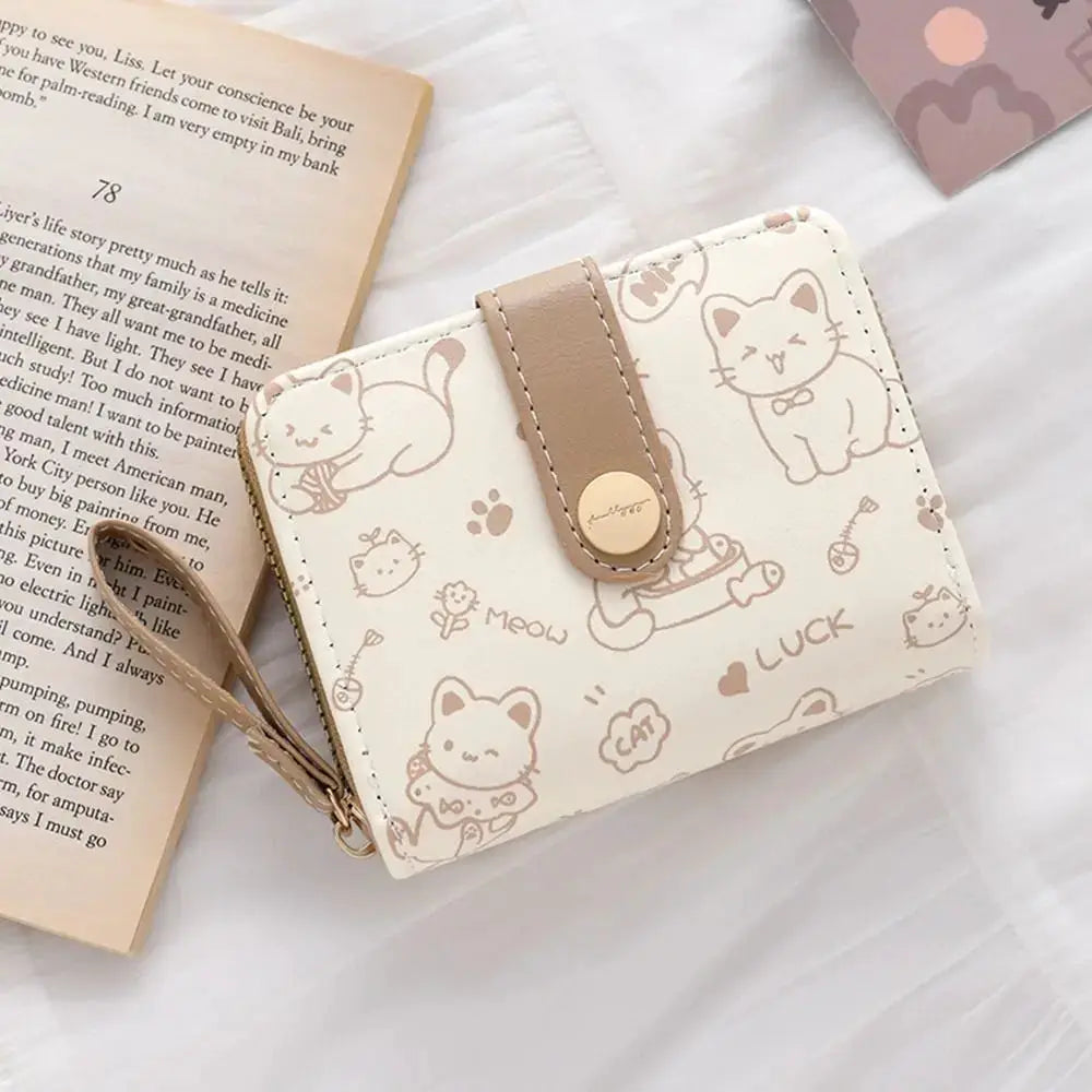 Cat coin purse wallet by Simples Market in cream PU leather with beige strap and gold snap