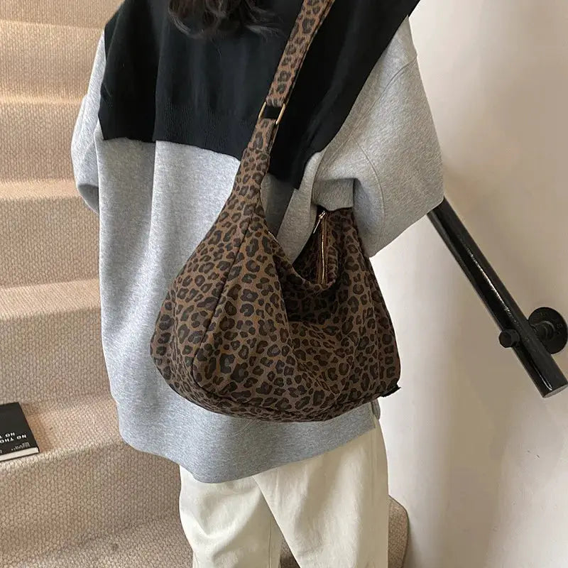 Leopard print women's shoulder bag, soft textile, large capacity crossbody for commute.