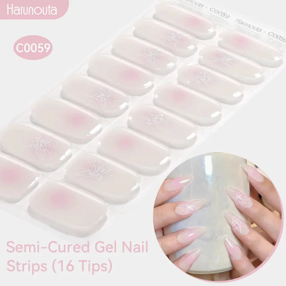 Semi-Cured Gel Nail Strips with pink gradient and sparkly snowflake design, 16 tips on sheet