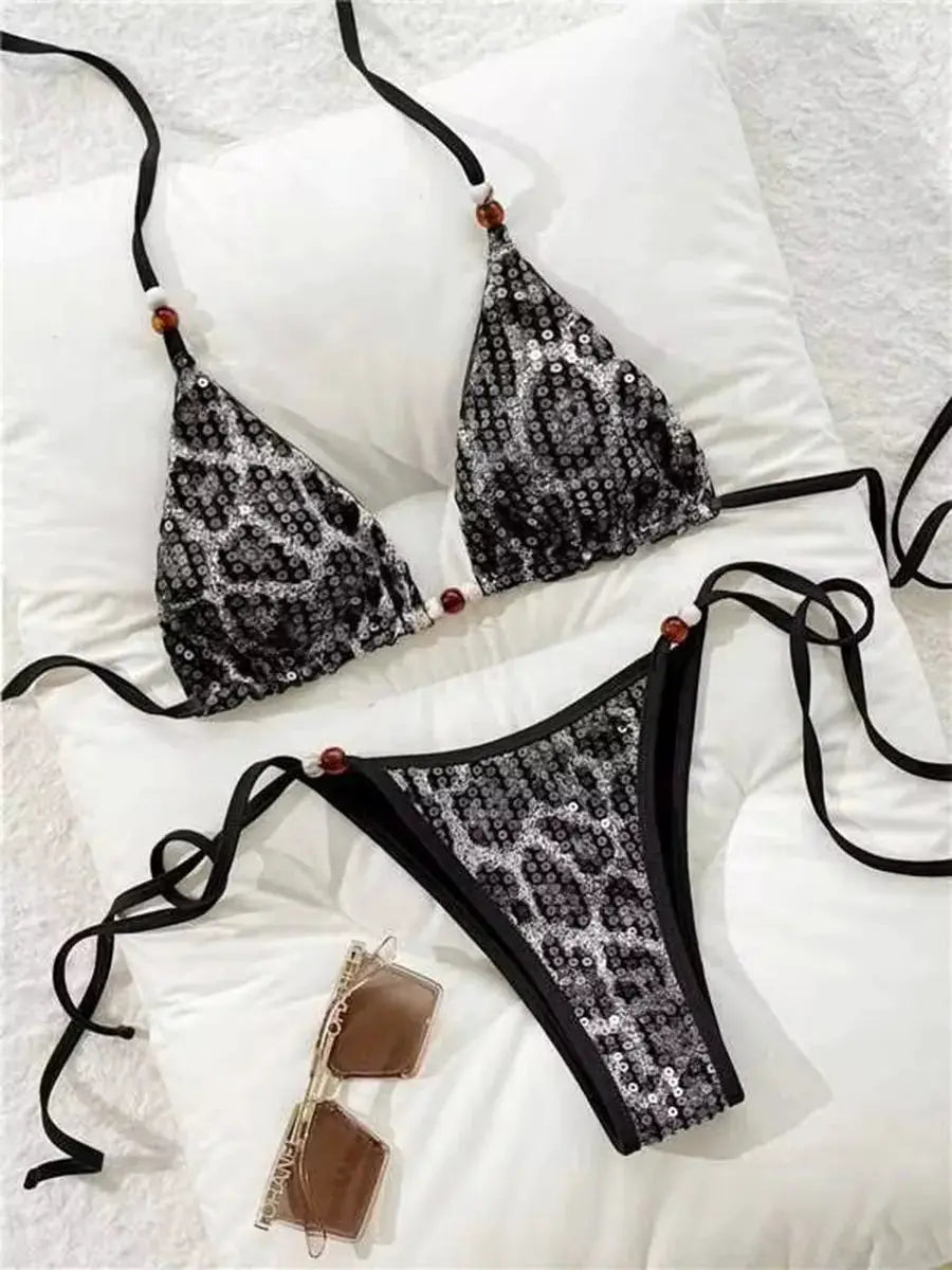 Leopard-sequin bikini set; black halter top and side-tie bottom; two-piece swimwear