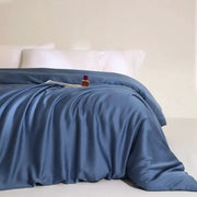 Eucalyptus Lyocell 1pc duvet cover in blue, cooling bamboo bedding on a bed with white pillows