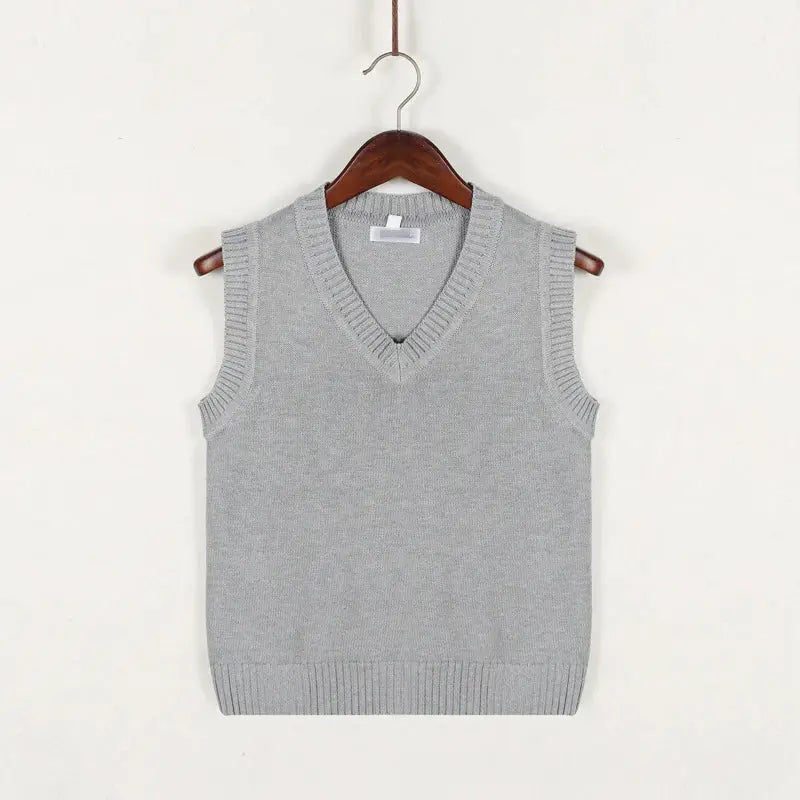 Men's grey knitted sleeveless V-neck sweater vest with ribbed hem for a casual preppy look.