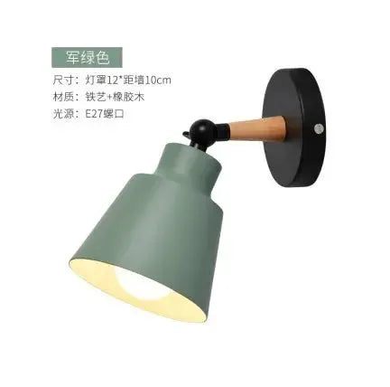 Nordic wall lamp with green metal shade, wooden arm, and black round backplate.