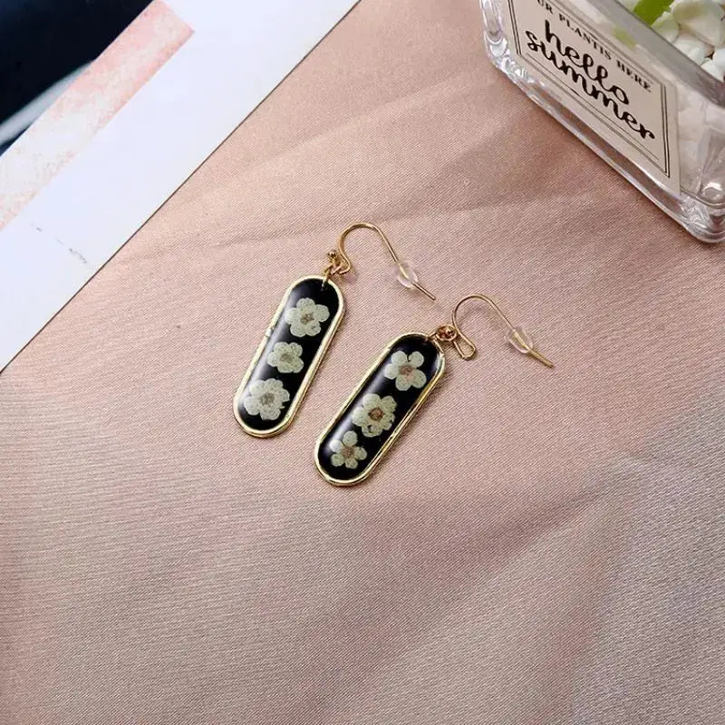 Unique design pressed flower earrings, black epoxy with gold rectangular frame, 2-pc set