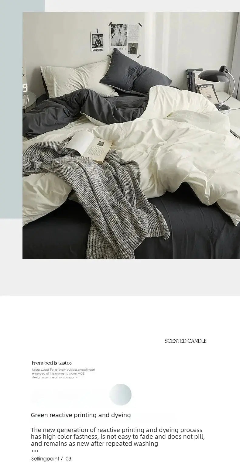 4-piece solid-color double-washed cotton duvet set in white and gray on a bed