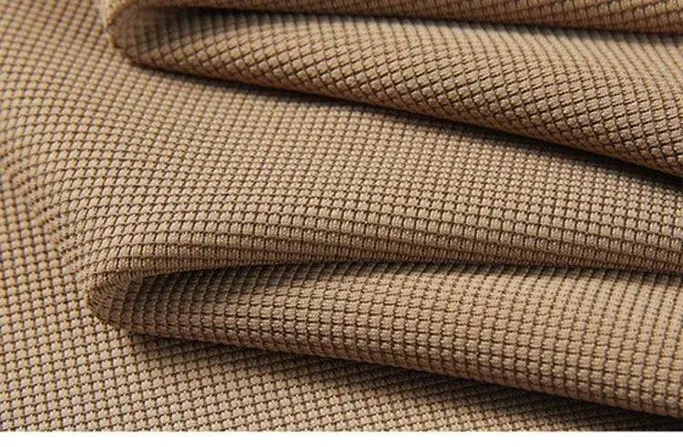 Men's polo shirt fabric swatch in beige with a small check pattern