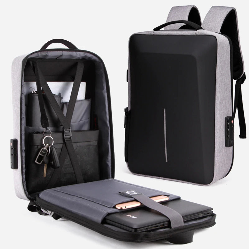 Men's casual hard-shell anti-theft backpack in grey with black front panel, USB charging, high-capacity laptop bag