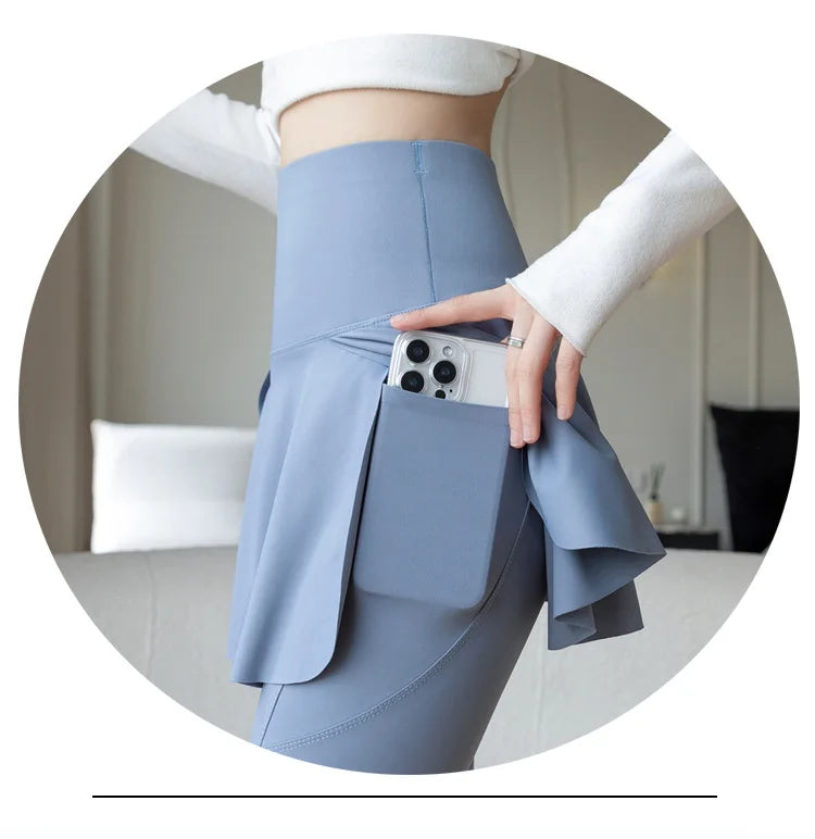 Women's blue high-waist seamless leggings with hip pocket and skirt overlay