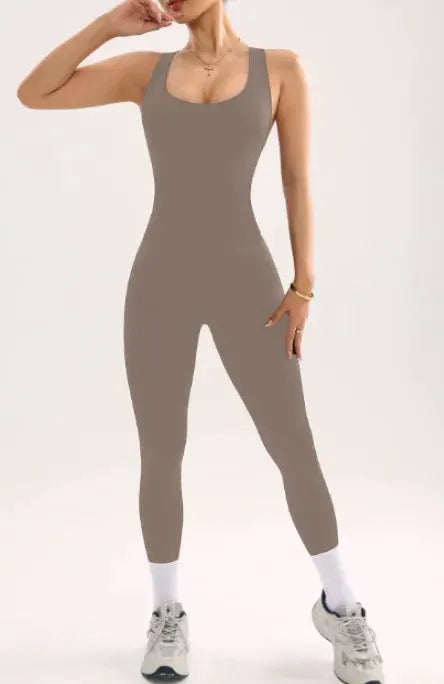 Women seamless ribbed jumpsuit in taupe; square-neck, full-length one-piece.