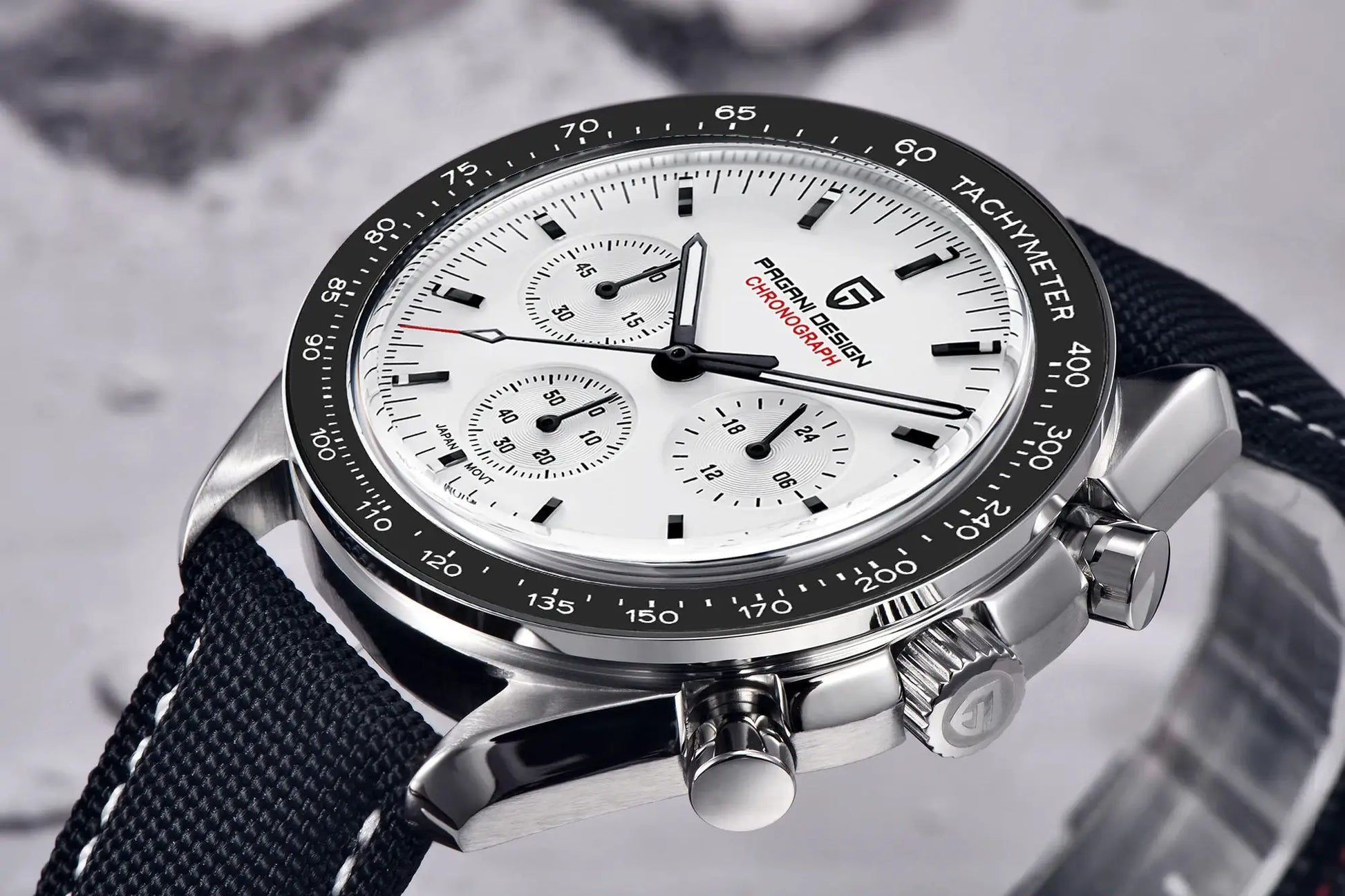 Pagani Design PD1701 men's chronograph watch with white dial, black tachymeter bezel, steel case, and fabric strap
