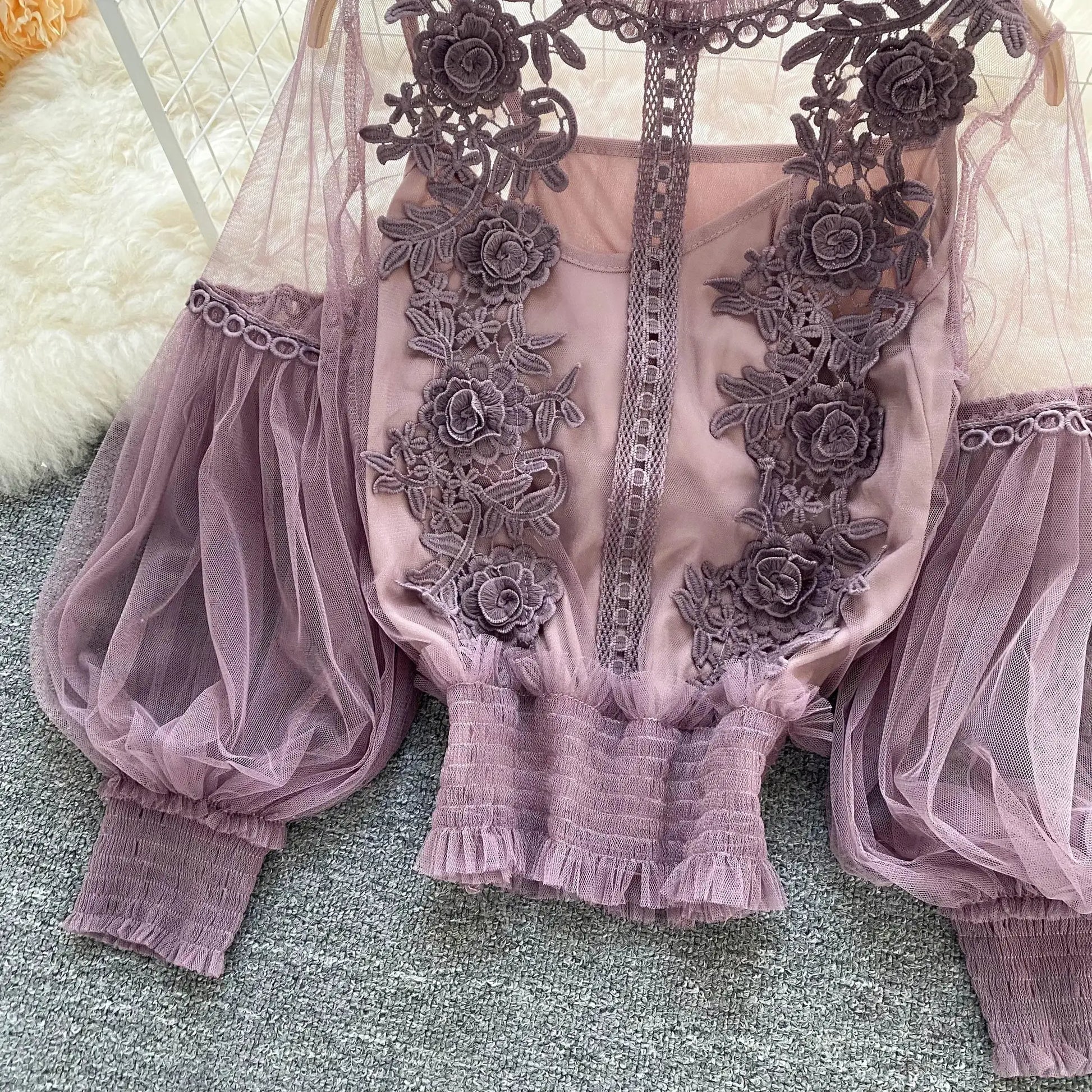 Lace puff long-sleeve lavender blouse with floral appliqué and sheer overlay