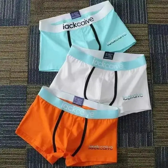 3-pack Simples Market men's cotton boxer briefs in teal, white, and orange with light blue waistbands