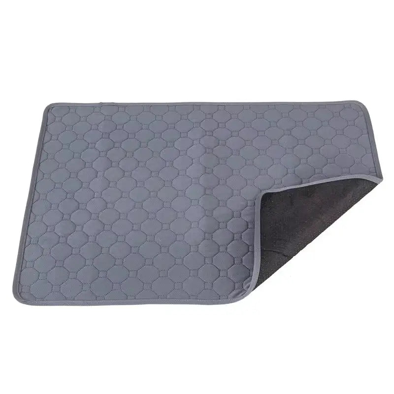 Guinea pig cage lining pad by Simples Market, grey quilted reusable pad with non-slip backing
