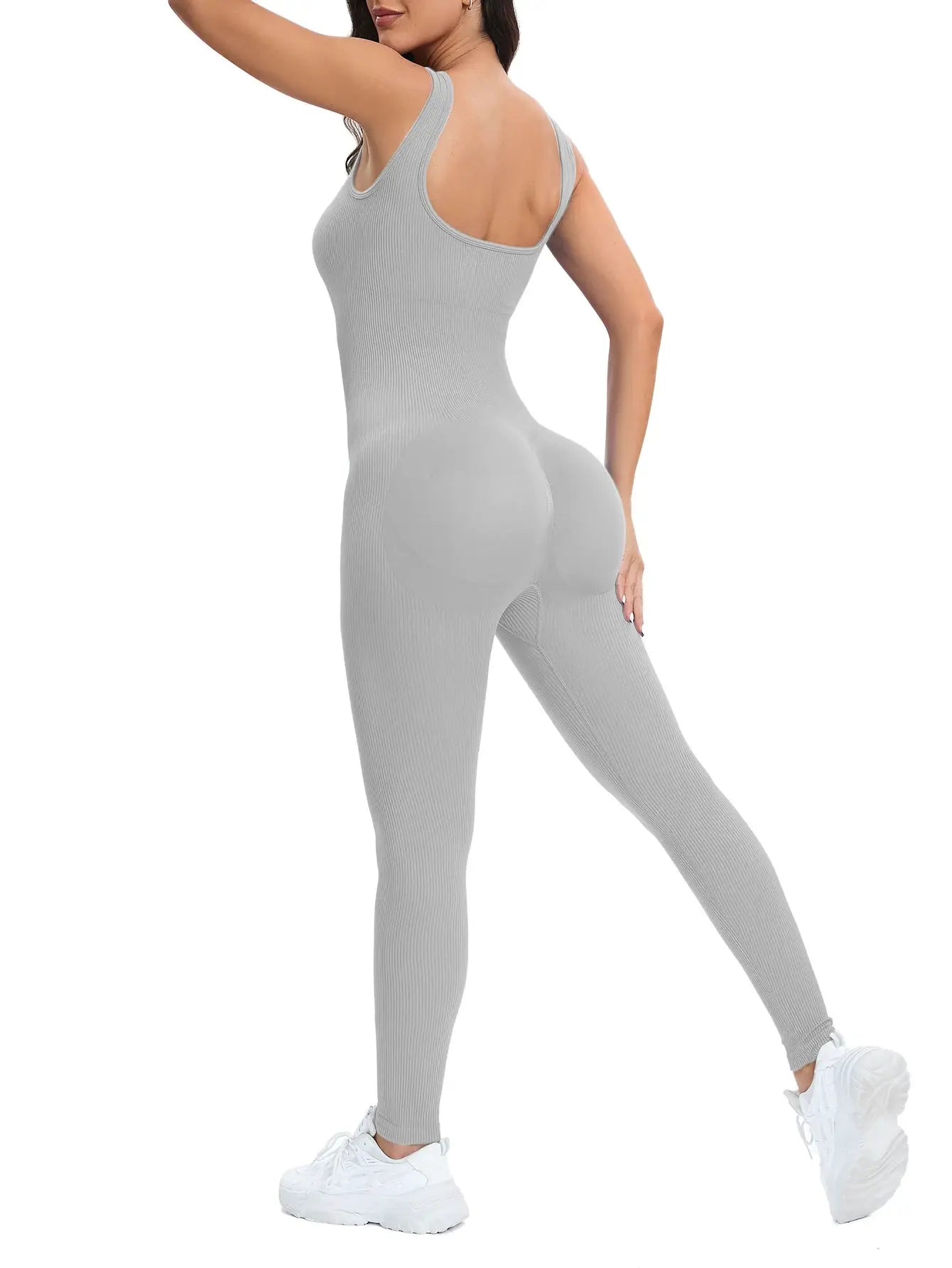 Shapewear jumpsuit in gray with built-in bra, ribbed, sleeveless bodycon romper, back view.