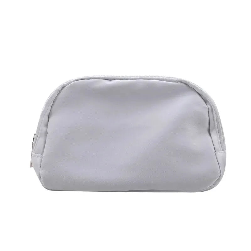 Gray waist bag with zipper, compact fanny pack for outdoor travel and everyday use