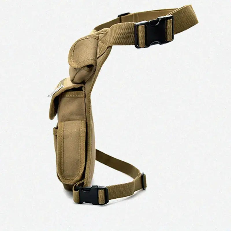 Canvas leg pack money belt for men; tan drop-waist fanny pack with adjustable straps and buckles.