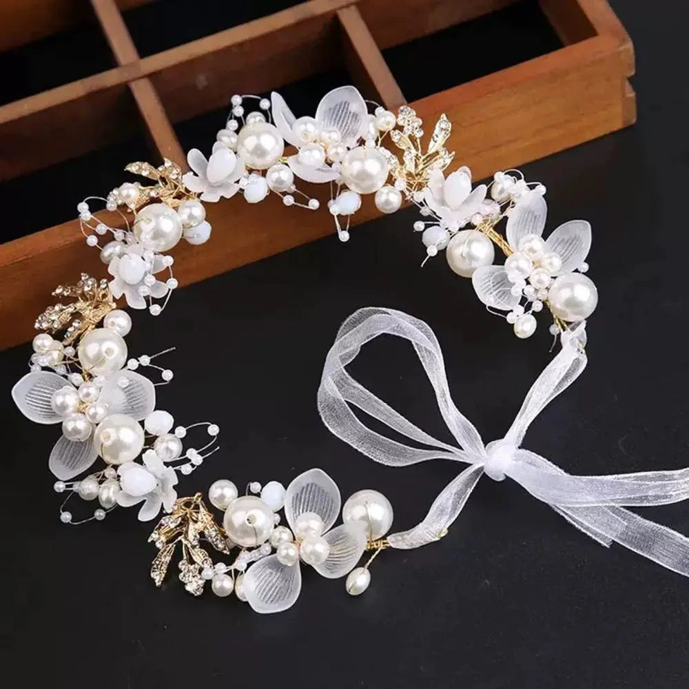Spring Bohemian Pearl Hair Crown for girls with white pearls, translucent petals, gold accents, and a white ribbon tie.